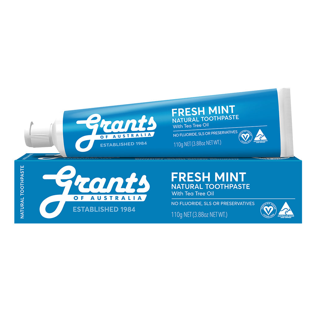 A tube of Grants of Australia Fresh Mint Natural Toothpaste placed on top of its packaging box.