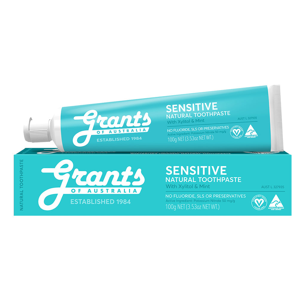 Tube of Grants Sensitive Natural Toothpaste sitting on its box